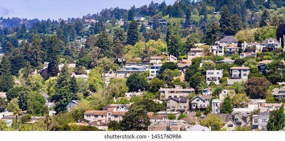 Aerial view of residential neighborhood built on a hill, Berkeley, San Francisco bay, California; 
