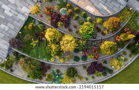 Aerial View of Residential Rockery Backyard Garden. Landscaping and Gardening Industry.
