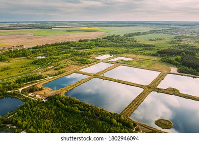 Aerial View Retention Basins, Wet Pond, Wet Detention Basin Or Stormwater Management Pond, Is An Artificial Pond With Vegetation Around The Perimeter, And Includes A Permanent Pool Of Water In Its