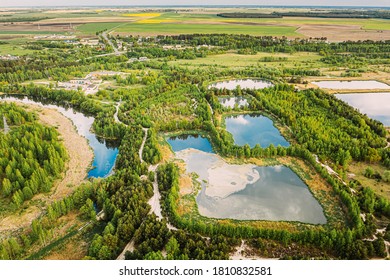 Aerial View Retention Basins, Wet Pond, Wet Detention Basin Or Stormwater Management Pond, Is An Artificial Pond With Vegetation Around The Perimeter, And Includes A Permanent Pool Of Water In Its