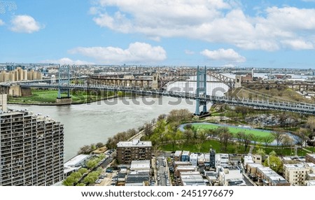 Aerial view of RFK Bridge, Hellgate Bridge and Astoria Park Queens.