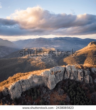 Aerial view of Rhodope Mountains with the rocks of Thracian sanctuary Belintash, Bulgaria