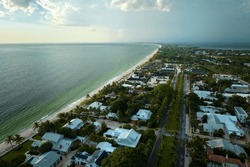 Aerial View Of Rich Neighborhood With Expensive Vacation Homes In Boca Grande, Small Town On Gasparilla Island In Southwest Florida. American Dream Homes As Example Of Real Estate Development In US