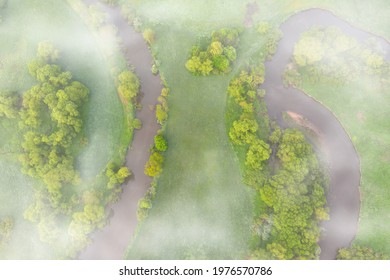 Aerial View Of River Meander In The Lush Green Vegetation Of The Delta
Top View Of The Valley Of A Meandering River Among Green Fields And Forests.
Romantic Background Concept