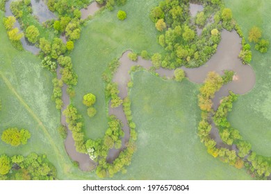 Aerial View Of River Meander In The Lush Green Vegetation Of The Delta
Top View Of The Valley Of A Meandering River Among Green Fields And Forests.
Romantic Background Concept