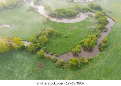 Aerial View Of River Meander In The Lush Green Vegetation Of The Delta
Top View Of The Valley Of A Meandering River Among Green Fields And Forests.
Romantic Background Concept