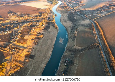 Aerial View Of The River Stretching Into The Distance, Blue Winding River