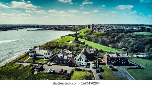 Aerial View of the River Tyne with the monument of Lord Collingwood. Aerial image taken on the coast of Tynemouth.