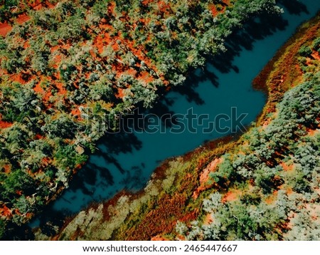 Aerial View of River Waterhole Surrounded by Red Rocks in the Pilbara Kimberley Region Western Australia Cliffs Desert Outback
