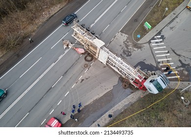 Aerial View Of Road Accident With Overturned Truck Blocking Traffic