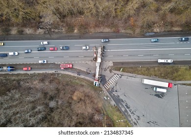 Aerial View Of Road Accident With Overturned Truck Blocking Traffic