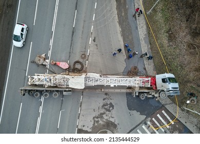 Aerial View Of Road Accident With Overturned Truck Blocking Traffic