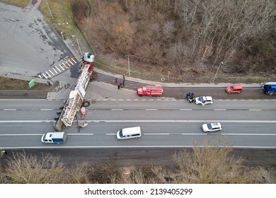 Aerial View Of Road Accident With Overturned Truck Blocking Traffic