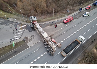 Aerial View Of Road Accident With Overturned Truck Blocking Traffic