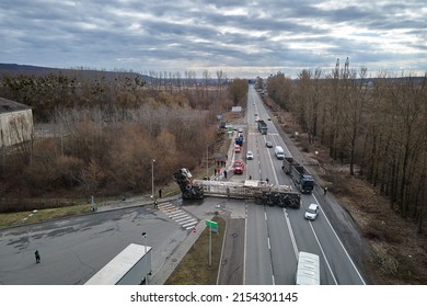 Aerial View Of Road Accident With Overturned Truck Blocking Traffic