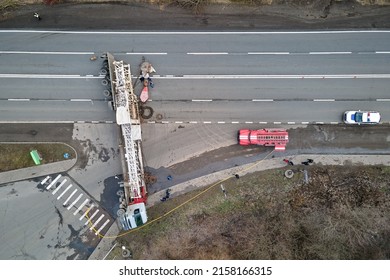 Aerial View Of Road Accident With Overturned Truck Blocking Traffic