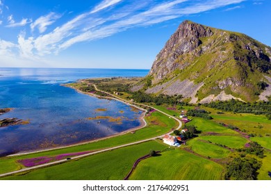 Aerial View Of A Road Going Through Lofoten Islands Along The Atlantic Ocean In Norway.