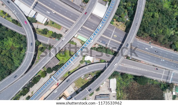 Aerial view road or\
highway network connection or intersection for import export or\
transportation concept.