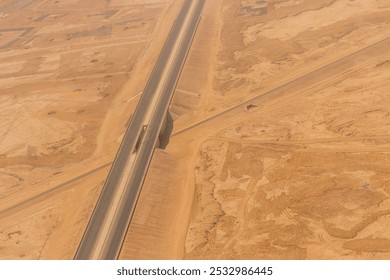 Aerial view of road and railway crosssing near Riyadh, Saudi Arabia - Powered by Shutterstock