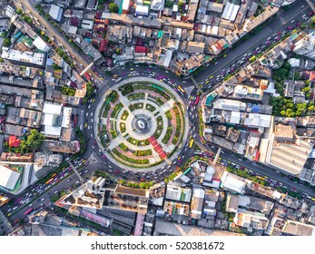 Aerial View Road Roundabout With Car Lots Wongwian Yai In Bangkok,Thailand.street Large Beautiful Downtown At Night.cityscape.Top View.