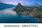 Aerial view of Rocca of Calde and Lake Maggiore in background during sunset, in the summer day, Castelveccana, Italy