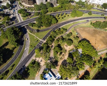 Aerial View Of Rodrigo De Freitas Lagoon, South Zone Of Rio De Janeiro, Brazil. In The Background, The Beaches Of Ipanema And Leblon. Sunny Day. Cars Traveling On Avenida Epitácio Pessoa. Drone Photo.