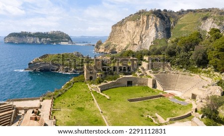 Aerial view of the Roman theater in the Pausilypon archaeological park. These ancient Roman ruins are located in Posillipo district in Naples, Campania, Italy. In the background the island of Nisida.