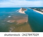 Aerial view of the Rompido Arrow (La Flecha del Rompido), a sand bank formed on the Rompido and Portil beaches that already reaches La Bota beach, in the municipality of Punta Umbria, Huelva province