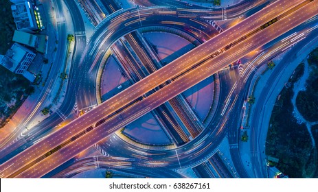 Aerial view roundabout interchange of a city, Expressway is an important infrastructure. - Shutterstock ID 638267161