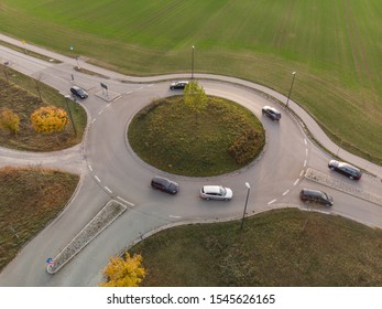 Aerial View Of Roundabout Traffic With Car