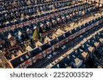 An aerial view of rows of back to back terraced houses in a working class area of a Northern town in England