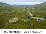 Aerial view of ruined Staigue stone fort Iveragh peninsula in County Kerry, Ireland. Drone Landscape