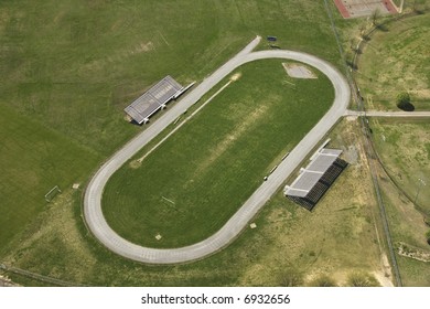 Aerial View Of Running Track With Bleachers.