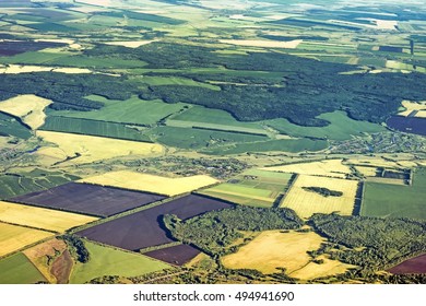 Aerial View Of Rural Countryside Landscape Scenery In Central Europe Ural Russia With Agricultural Field Crop Forest Village Settlement Road Detail Satellite Exterior Top Down Above Overview