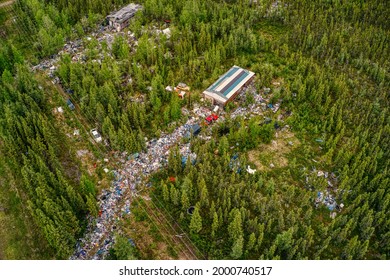 Aerial View Of A Rural Hoarder House Overflowing With Garbage