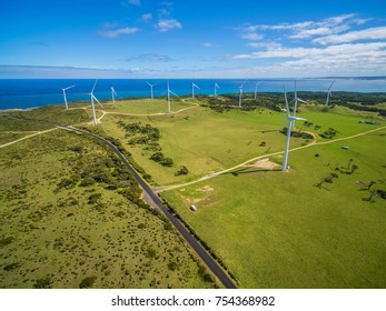 Aerial view of rural road and wind farm in Australia