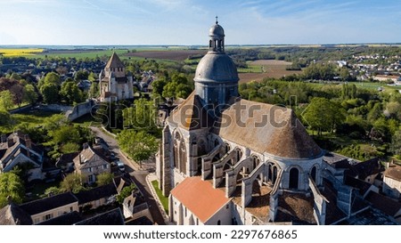 Aerial view of the Saint Quiriace Collegiate Church in Provins, a medieval city in Seine et Marne, France - Slate dome on top of a hill in the French countryside