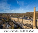 Aerial view of Salts Mill, Saltaire, UNESCO World Heritage Site and a former Victorian textile mill owned by Titus Salt. Bradford, West Yorkshire.