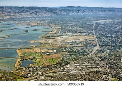 Aerial view of San Francisco bay area in California United States of America scenery with Moffett airfield city of San Jose 101 root bayshore freeway satellite landmark - Powered by Shutterstock