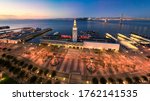 Aerial View of San Francisco Ferry Building and Plaza illuminated at night. Empty during shelter in place due to coronavirus. California, USA