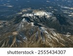 An aerial view of the San Francisco Peaks Lockett Meadow and Bill Williams Mountains in the United States of America.