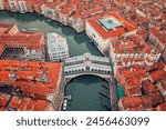 Aerial view of San Marco and rooftops from drone, Venice cityscape and Venetian lagoon. Italy