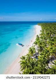 Aerial view of Saona Island in Dominican Republuc. Caribbean Sea with clear blue water and green palms. Tropical beach. The best beach in the world. - Shutterstock ID 2119042271