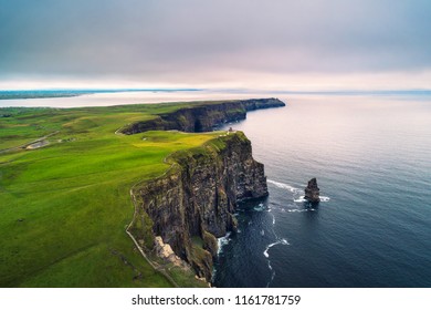 Aerial view of the scenic Cliffs of Moher in Ireland. This popular tourist attraction is situated in County Clare along the Wild Atlantic Way. - Shutterstock ID 1161781759