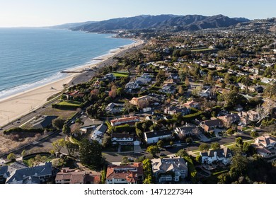 Aerial view of scenic ocean view Pacific Palisades homes and streets in Los Angeles, California. - Shutterstock ID 1471227344