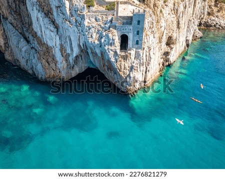 Aerial view of sea and coastline, Sardinia, Italy. Porto Flavia, kayaks