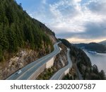 Aerial View of Sea to Sky Highway in Howe Sound. Sunset Sky. Between Squamish and Vancouver, BC, Canada.