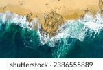 Aerial view of sea waves and fantastic Rocky coast. Aerial view Top down seashore. Waves crashing on rock cliff. Aerial drone top view of ocean