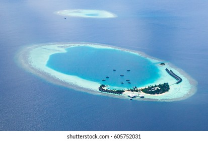 Aerial View From A Seaplane Of The Maldives Atolls.