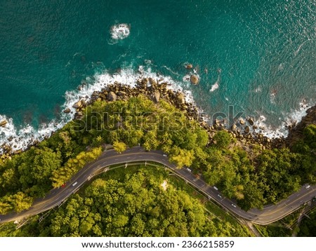 Aerial view seashore with mountains at Phuket Thailand, Beautiful seacoast view at open sea in summer season, Nature recovered Environment and Travel background